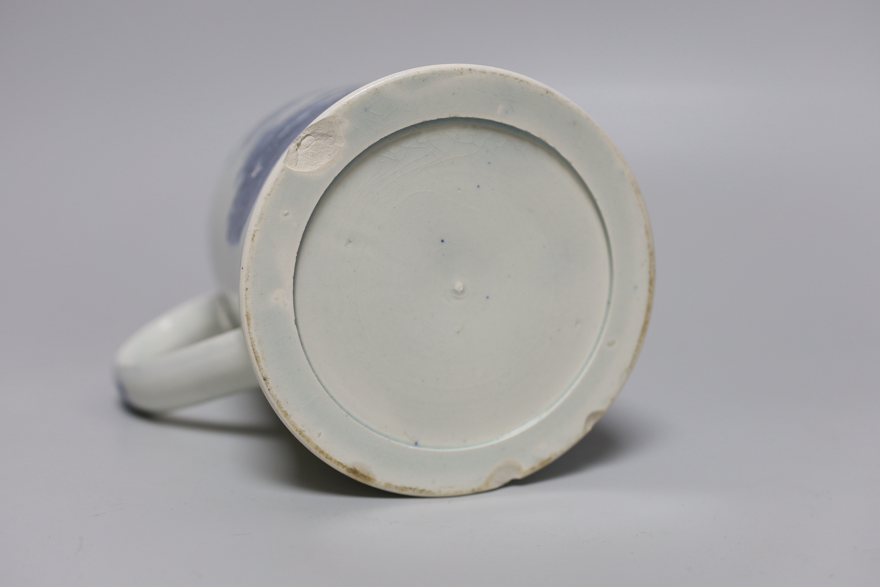 A group of mixed late 18th/early 19th century blue and white pearlware etc. tea canisters and mugs, the largest 14cm high